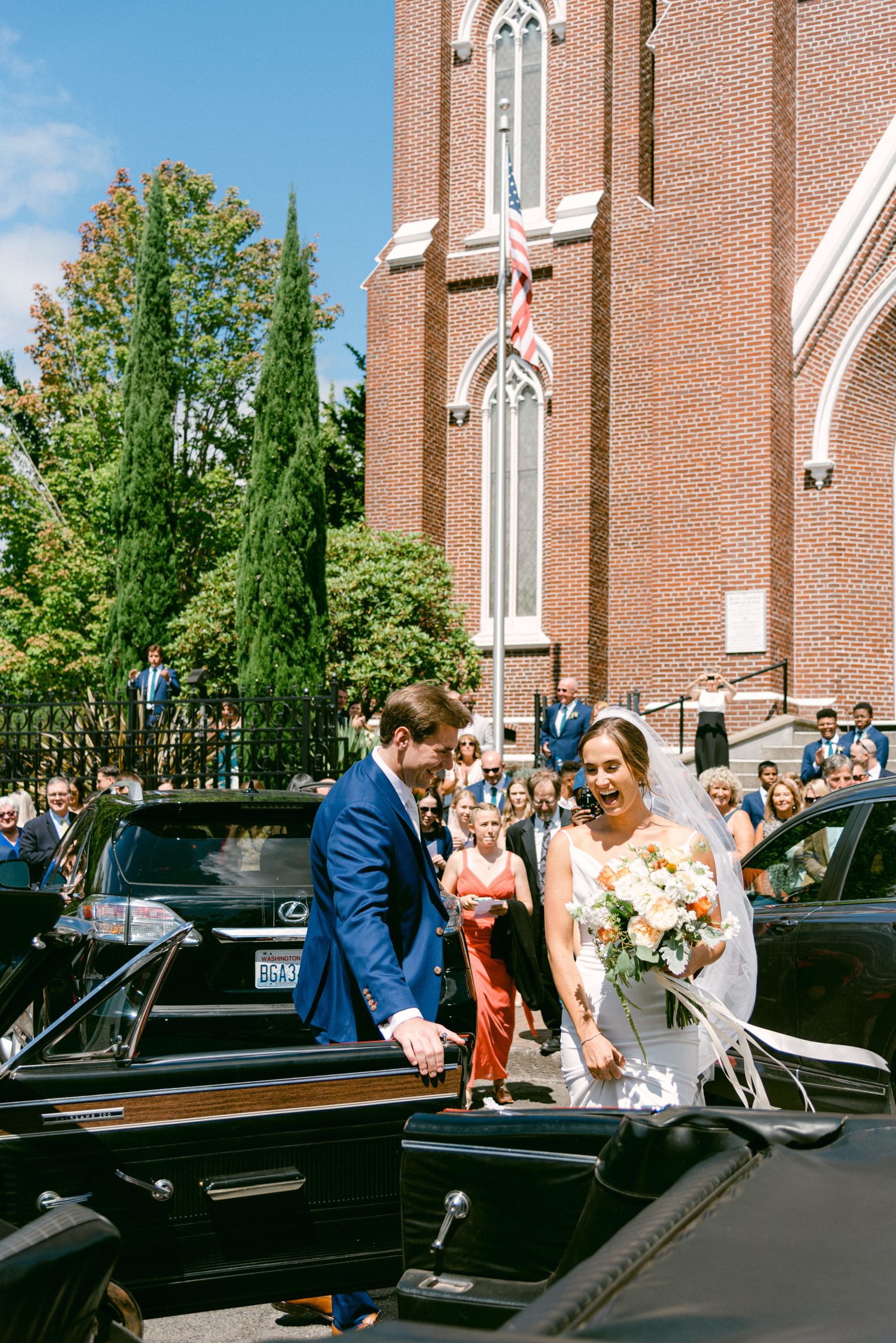 Portland Wedding Photographer // Catholic Wedding // Bride and Groom Leaving Ceremony, Vintage Car