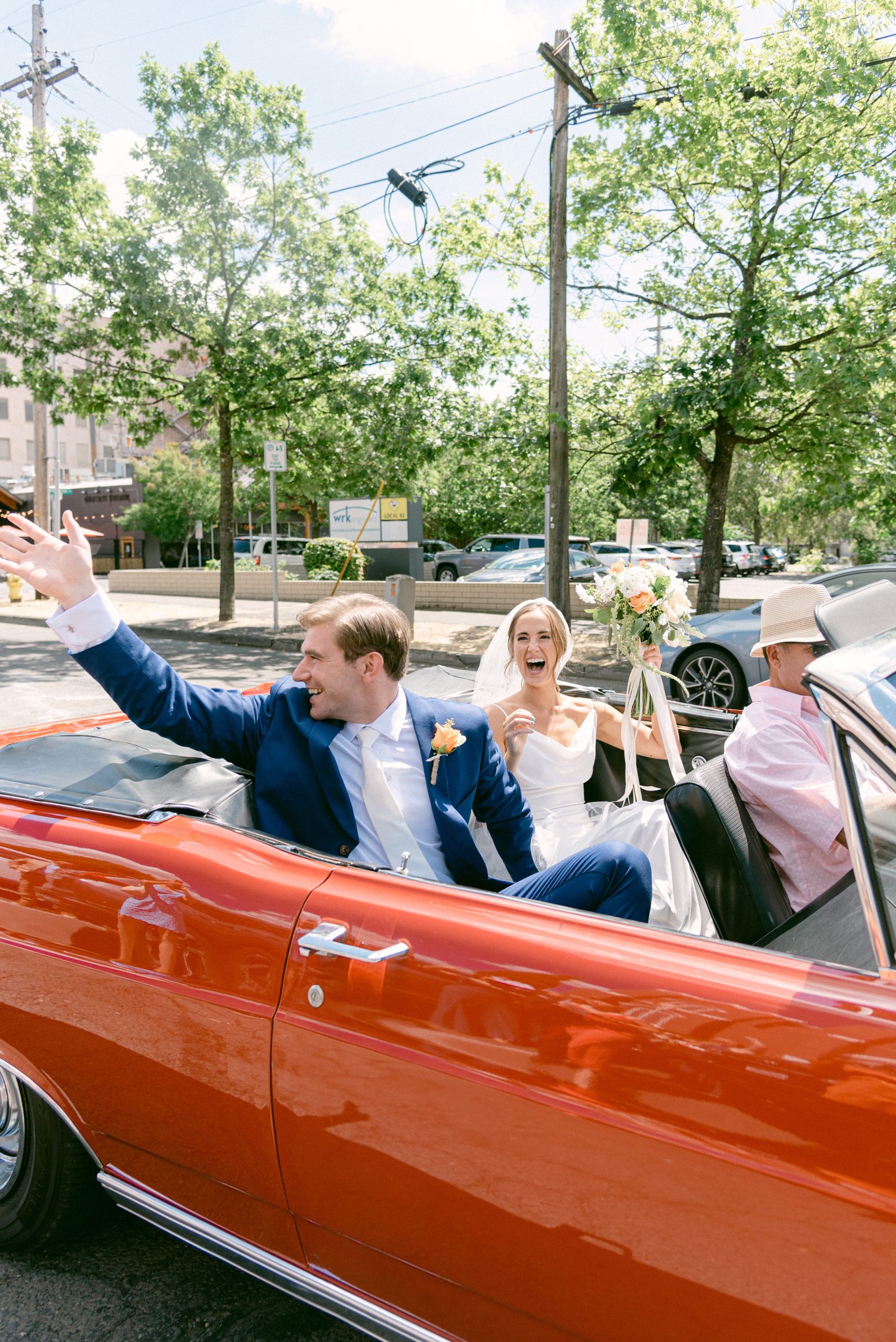 Portland Wedding Photographer // Catholic Wedding // Bride and Groom Leaving Ceremony // Vintage Car
